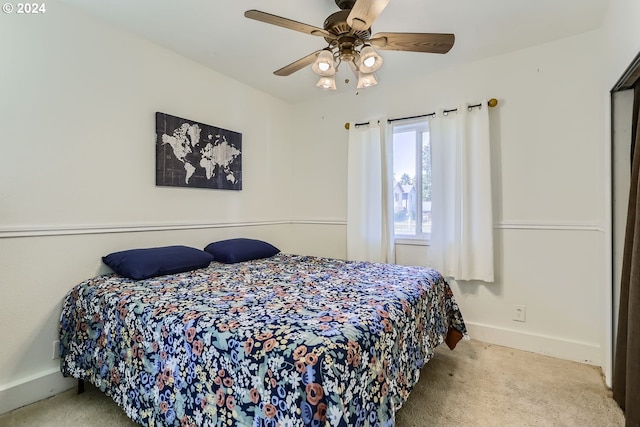 bedroom featuring ceiling fan and light colored carpet