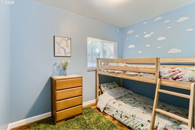 bedroom featuring wood-type flooring