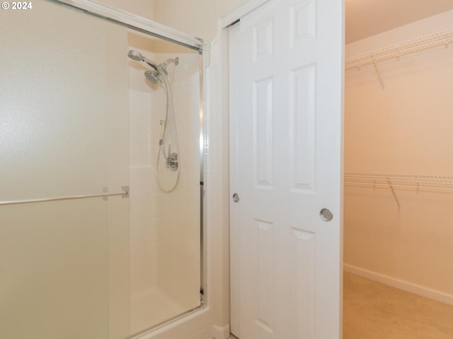 bathroom featuring walk in shower