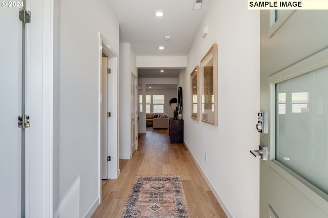 hall featuring light wood-type flooring