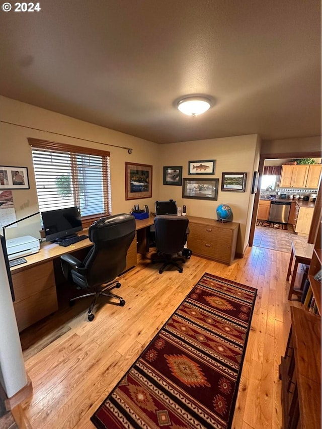 home office featuring light hardwood / wood-style floors