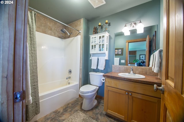 full bathroom with vanity, shower / bath combination with curtain, and toilet