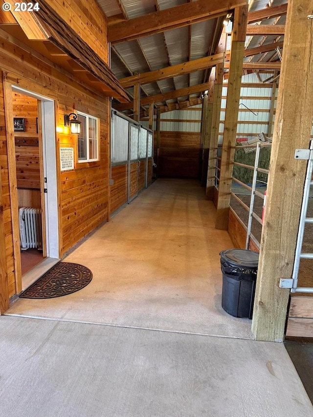 view of horse barn featuring radiator