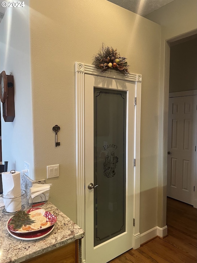 bathroom with vanity and wood-type flooring