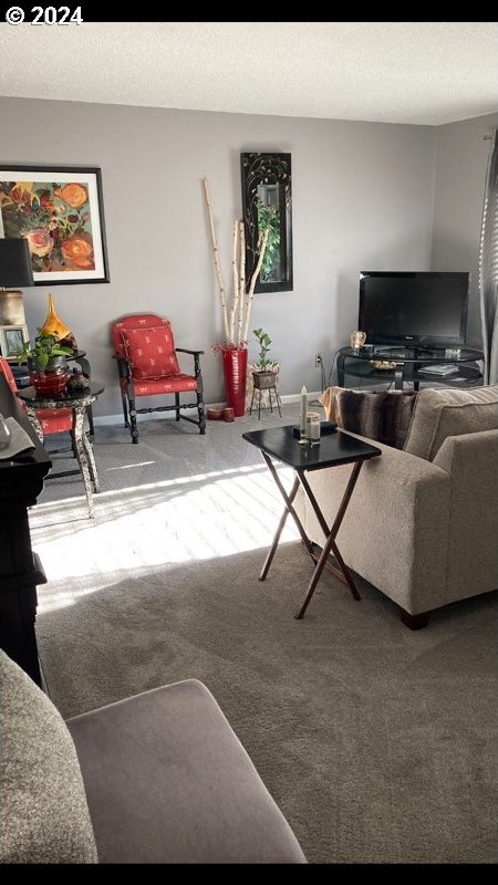 14655 SW 76th Ave Unit 5, Tigard, OR 97224 - living area featuring carpet flooring and baseboards