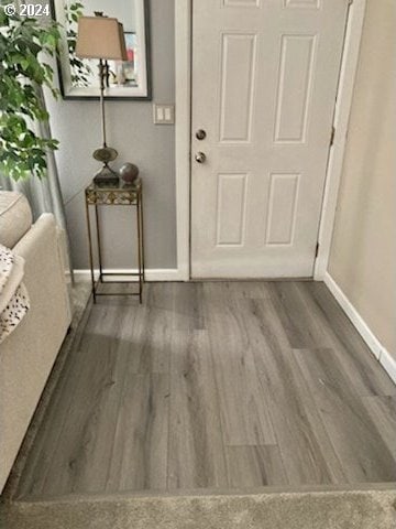14655 SW 76th Ave Unit 5, Tigard, OR 97224 - doorway to outside with baseboards and wood finished floors