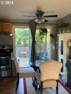 14655 SW 76th Ave Unit 5, Tigard, OR 97224 - dining room featuring a ceiling fan and wood finished floors