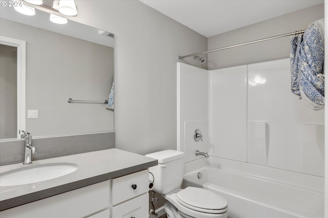 full bathroom with vanity, toilet, and shower / tub combination