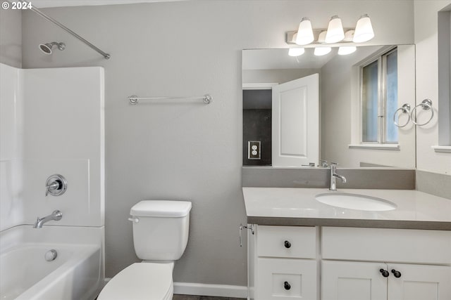 full bathroom featuring vanity, toilet, and shower / bathtub combination