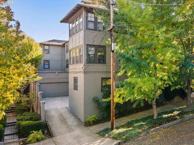 view of property exterior with a garage