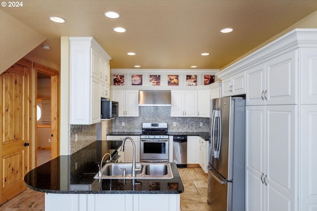 kitchen with white cabinets, appliances with stainless steel finishes, and sink