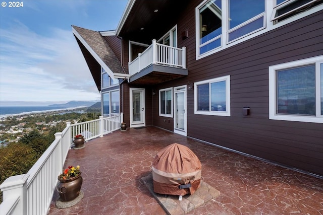 view of patio with a balcony