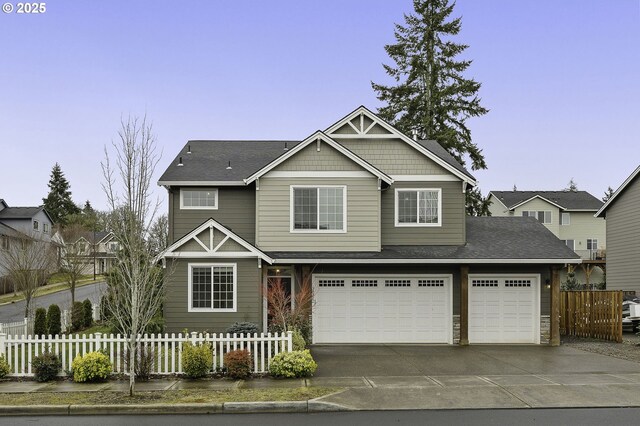 craftsman-style house featuring a garage