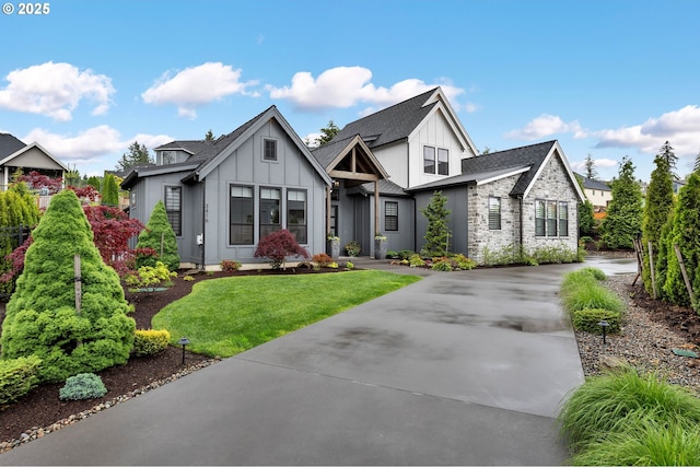 view of front of home with a front yard