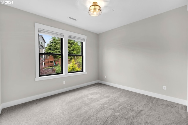 view of carpeted spare room