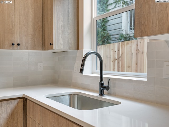 room details with tasteful backsplash and sink