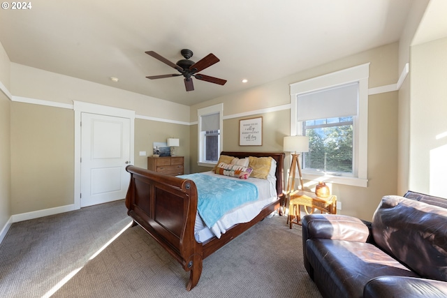 carpeted bedroom with ceiling fan