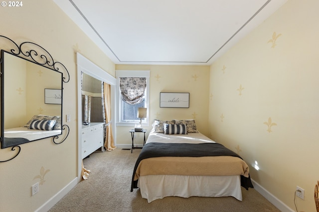 bedroom with light colored carpet