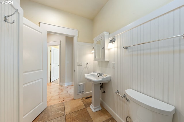 bathroom featuring toilet