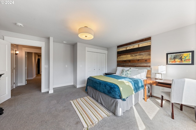 carpeted bedroom with a closet