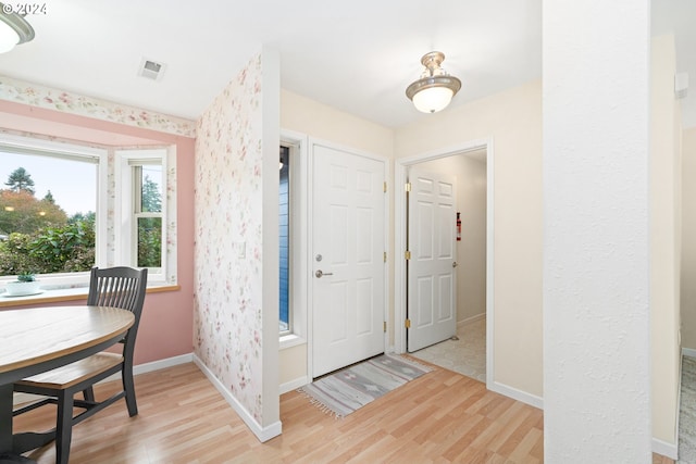 foyer featuring light hardwood / wood-style floors