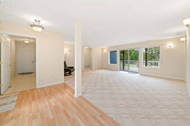 unfurnished room with light hardwood / wood-style floors