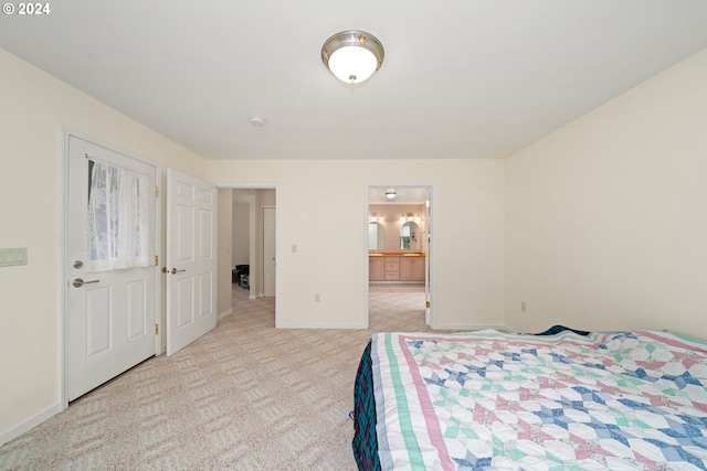 bedroom with light carpet