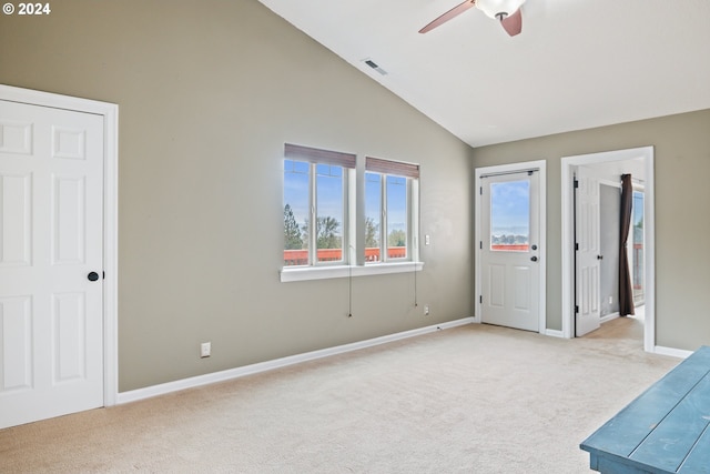 interior space with high vaulted ceiling and ceiling fan