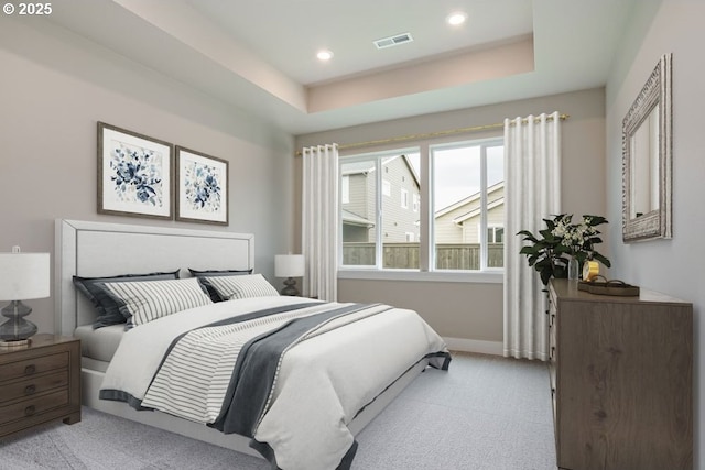 3818 S 44th Ln, Ridgefield, WA 98642 - bedroom with light carpet, baseboards, a tray ceiling, and recessed lighting