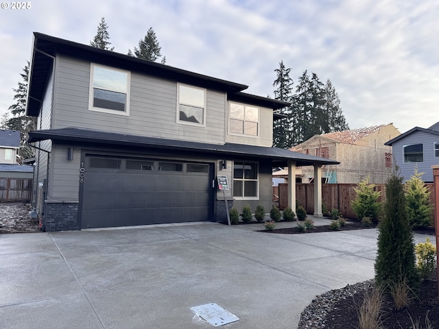 view of front of property featuring a garage