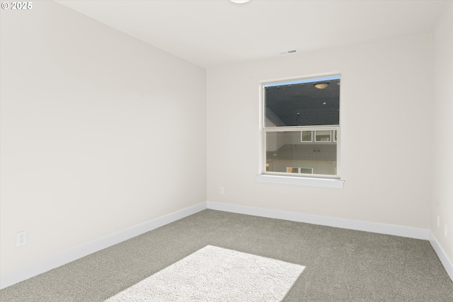 view of carpeted spare room