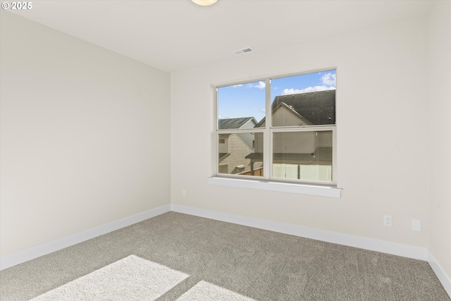 empty room with carpet flooring