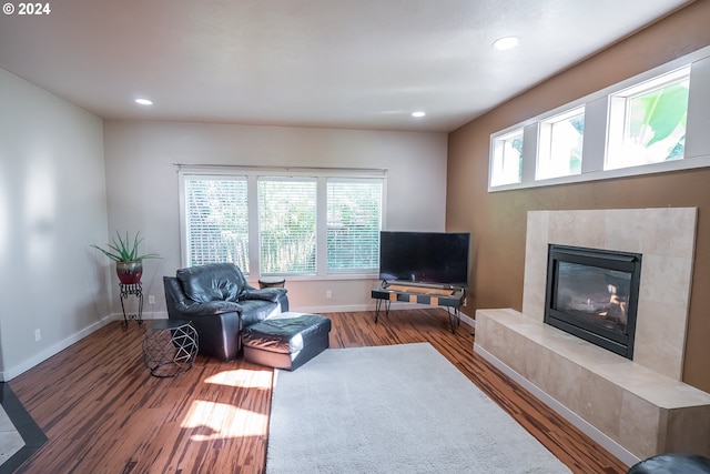 3348 Talon St, Eugene, OR 97408 - living room featuring a high end fireplace, baseboards, recessed lighting, and wood finished floors