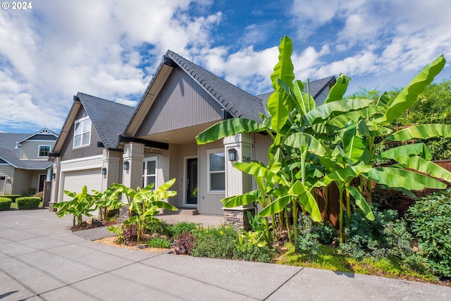 3348 Talon St, Eugene, OR 97408 - view of front facade with a shingled roof and concrete driveway