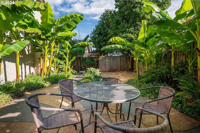 3348 Talon St, Eugene, OR 97408 - view of patio featuring a fenced backyard and outdoor dining area