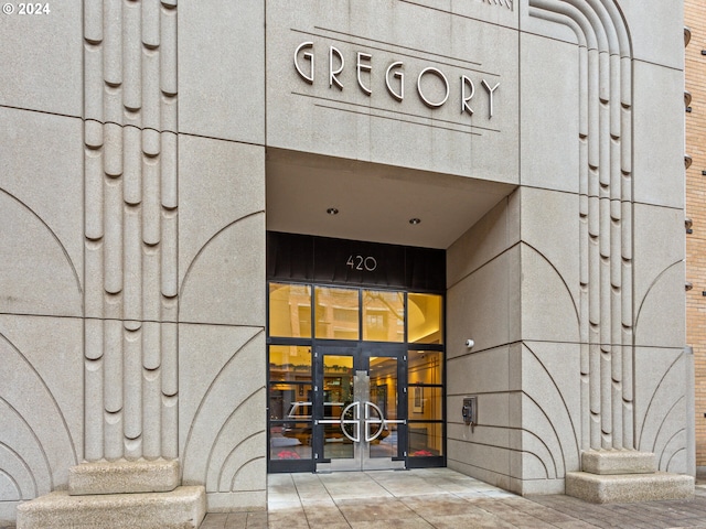 property entrance featuring french doors
