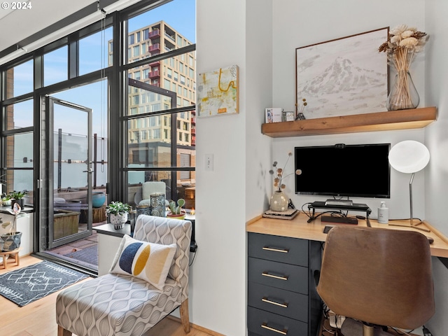 office space with light hardwood / wood-style flooring