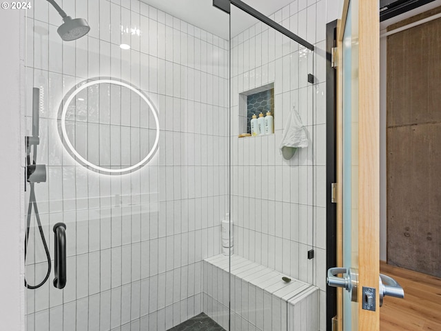 420 NW 11th Ave Unit 502, Portland, OR 97209 - full bath with a shower stall and wood finished floors