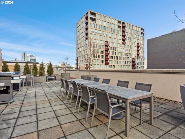 420 NW 11th Ave Unit 502, Portland, OR 97209 - view of patio / terrace featuring outdoor dining area