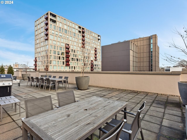 view of patio with outdoor dining area