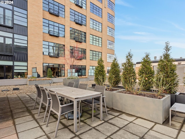 view of patio featuring outdoor dining space and area for grilling