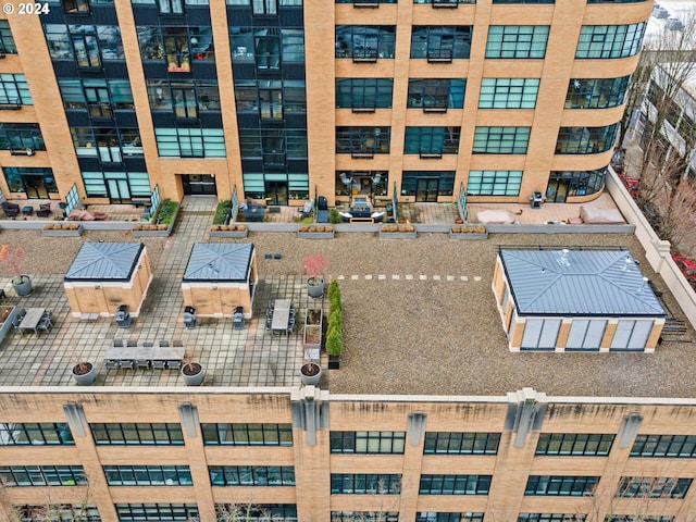 view of patio with outdoor dining space and grilling area