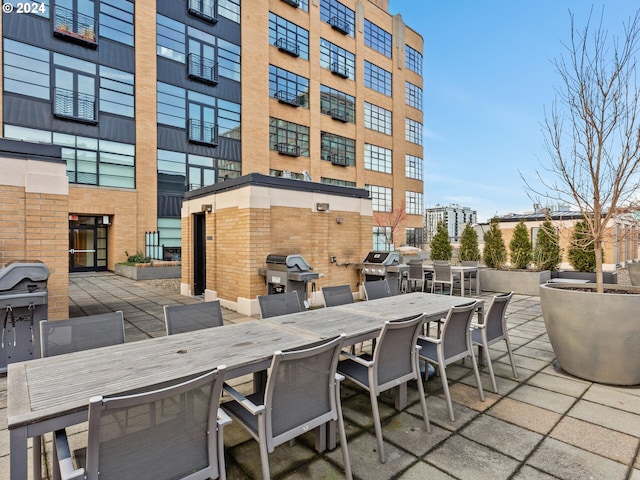 view of patio featuring a grill