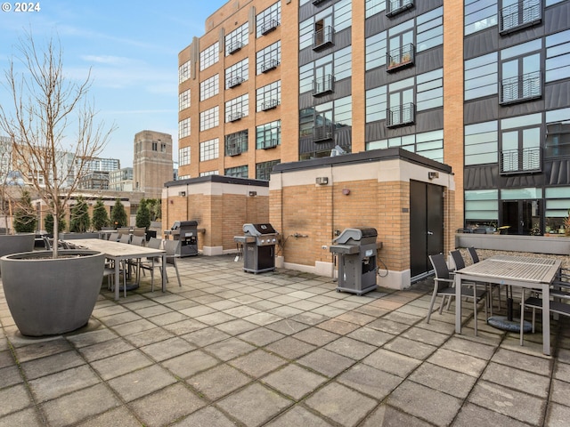 view of patio featuring a grill