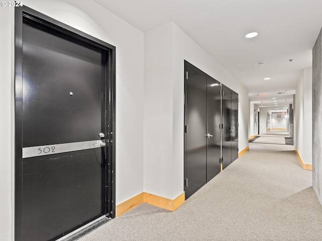 hallway with carpet