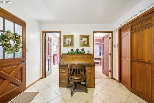 office with light tile patterned floors