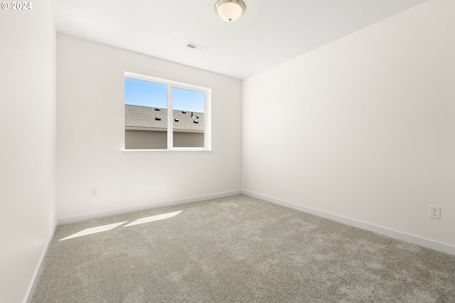 unfurnished room with carpet