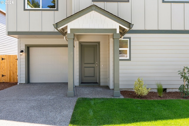 property entrance with a garage