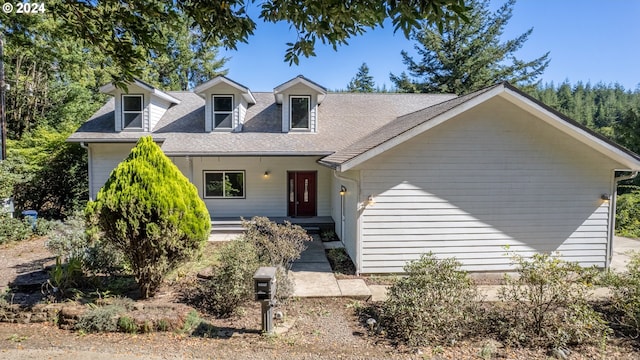 view of new england style home