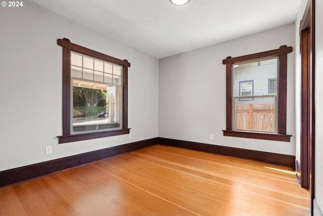 empty room featuring hardwood / wood-style flooring